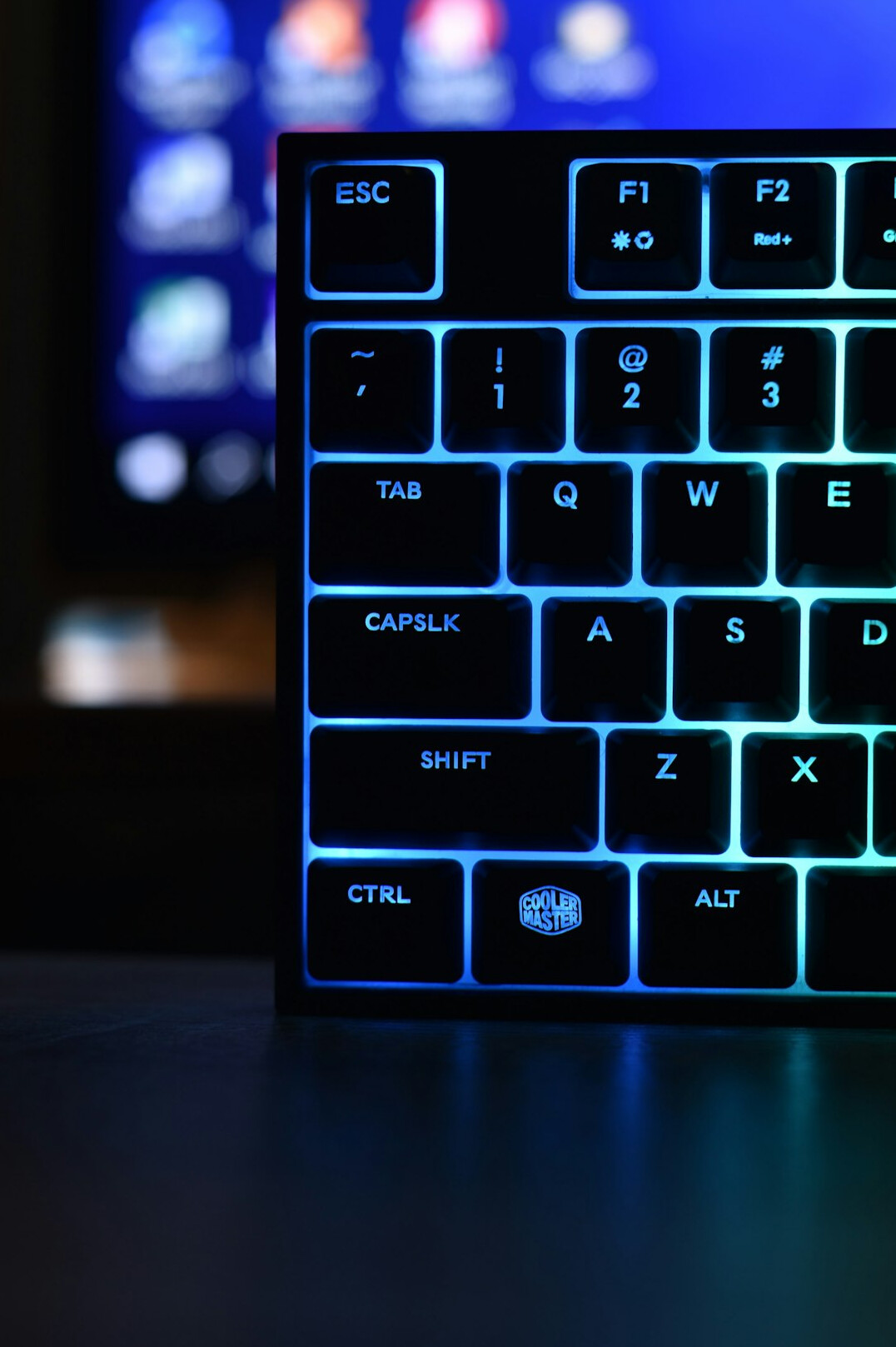 Close-up of a computer keyboard with backlit keys
