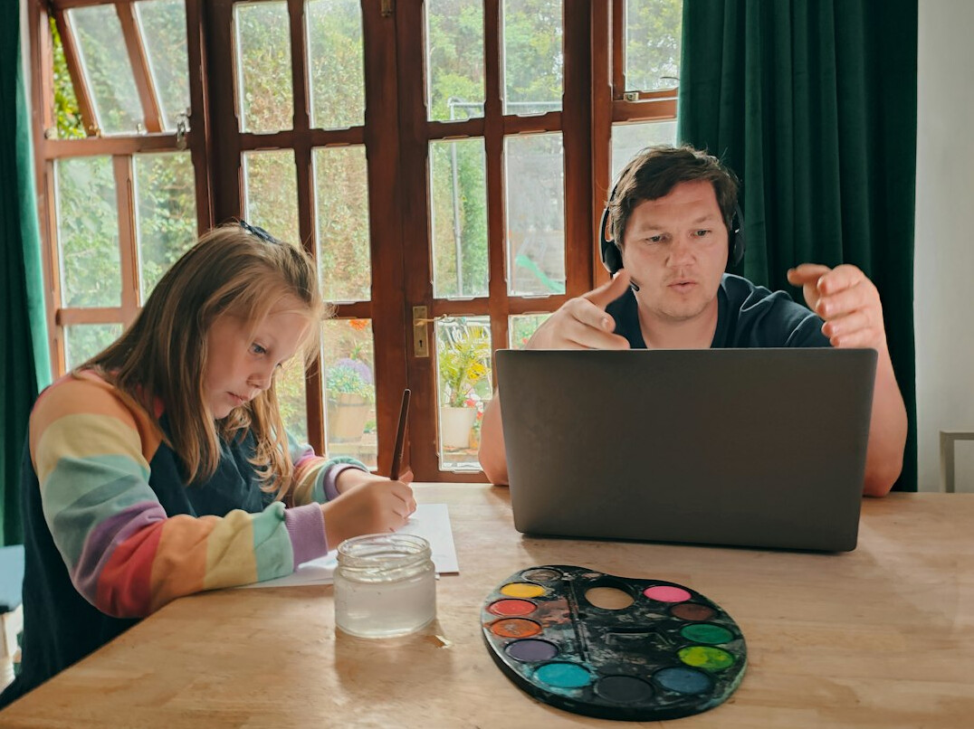kids working together on laptop