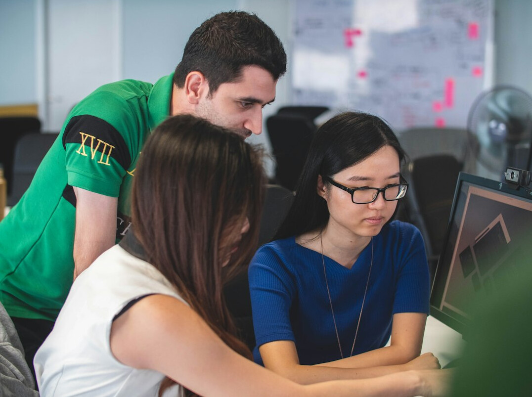 team discussing code