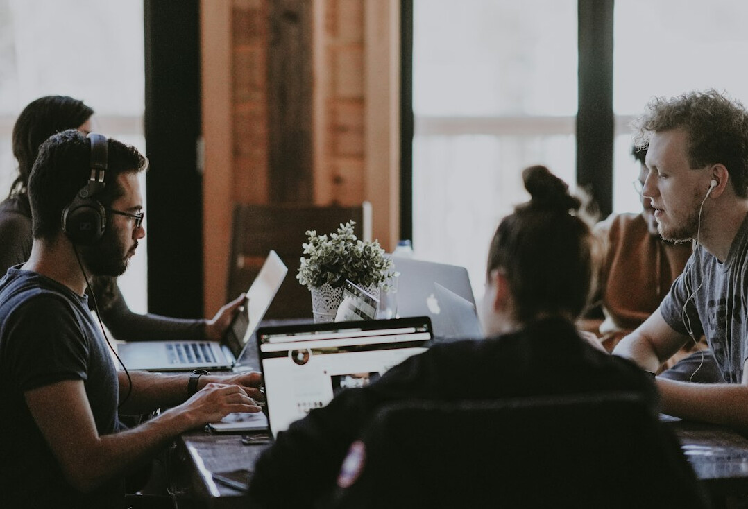 group of developers discussing